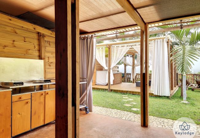 Bungalow à SAINT-LOUIS - Jardin de Montplaisir - Joli Coeur – Bungalow 25m² avec jacuzzi et vue sur la montagne – Saint-Louis Bungalow à SAINT-LOUIS - Jardin de Montplaisir - Joli Coeur – Bungalow 25m² avec jacuzzi et vue sur la montagne – Saint-Louis